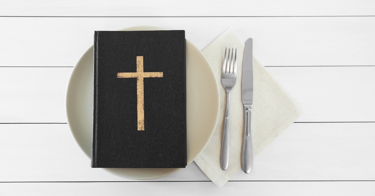 Bible on a dinner plate